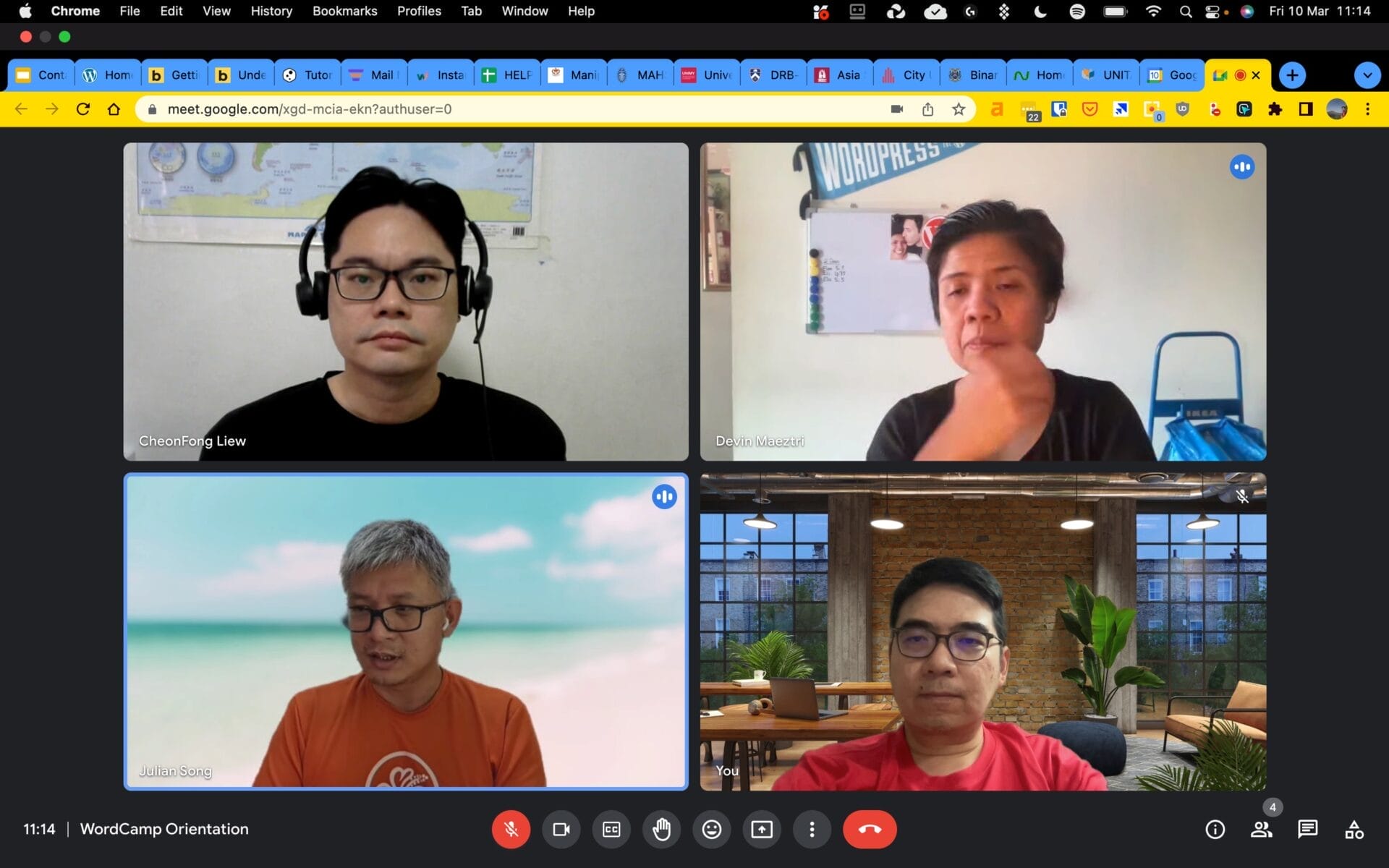 A video call with four participants, each in a different location, visible in separate frames on a Google Meet interface.